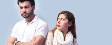 a man and woman posing for a picture