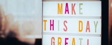a light box that says make this day great